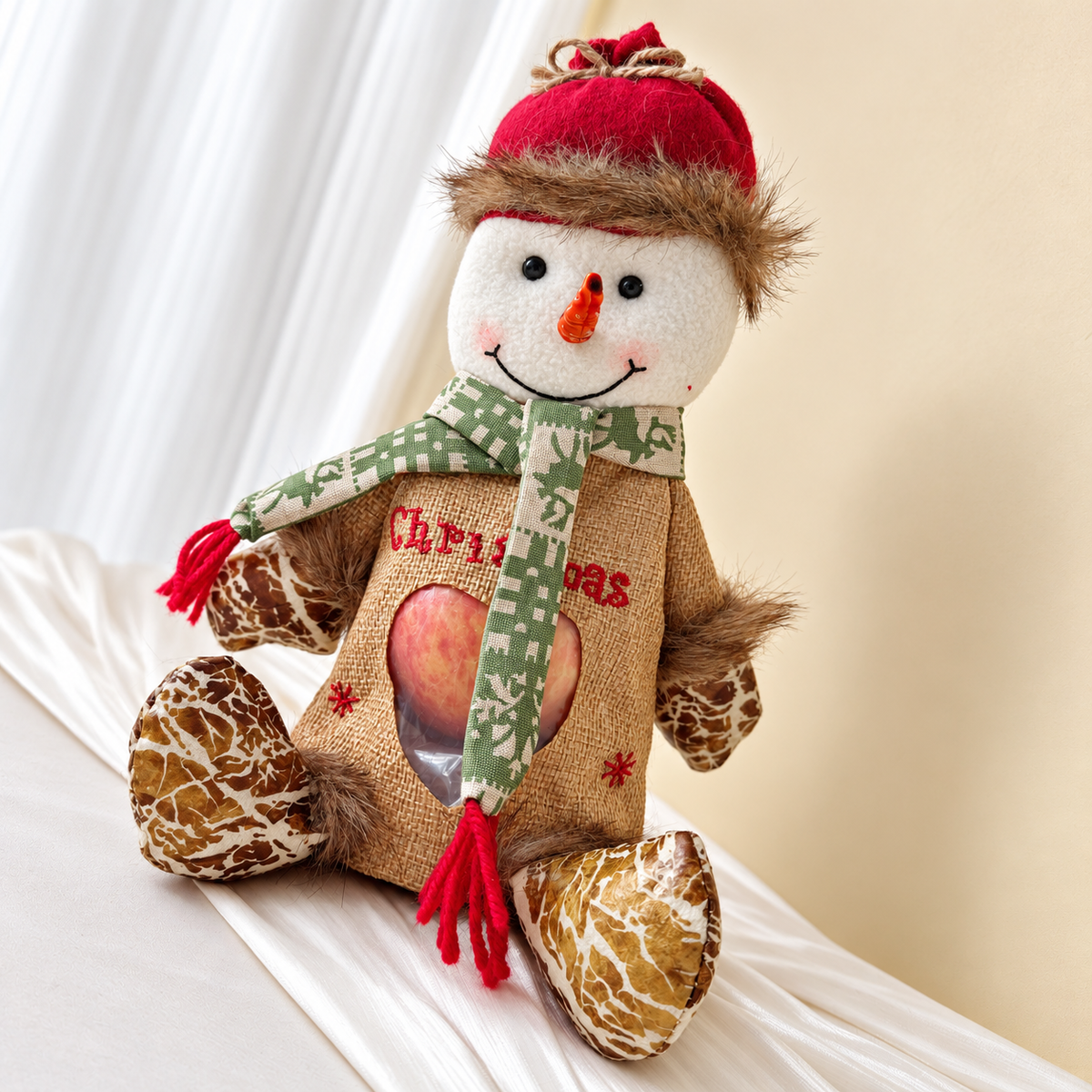 Snowman decorative doll with red hat and green scarf