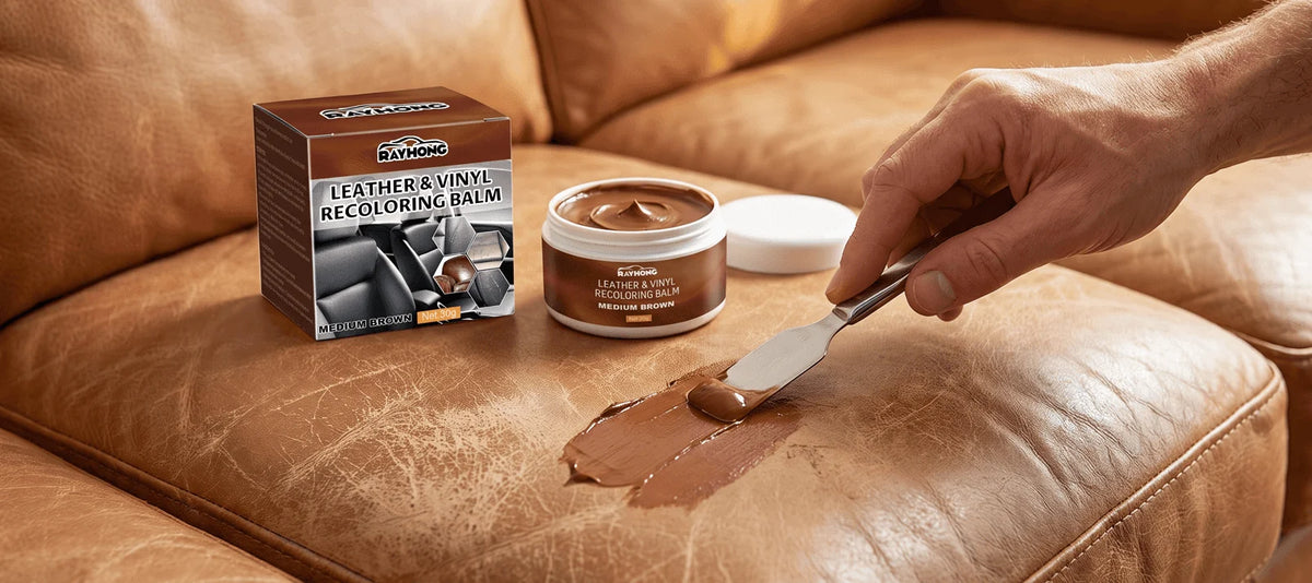 Brown balm being applied to a sofa cushion