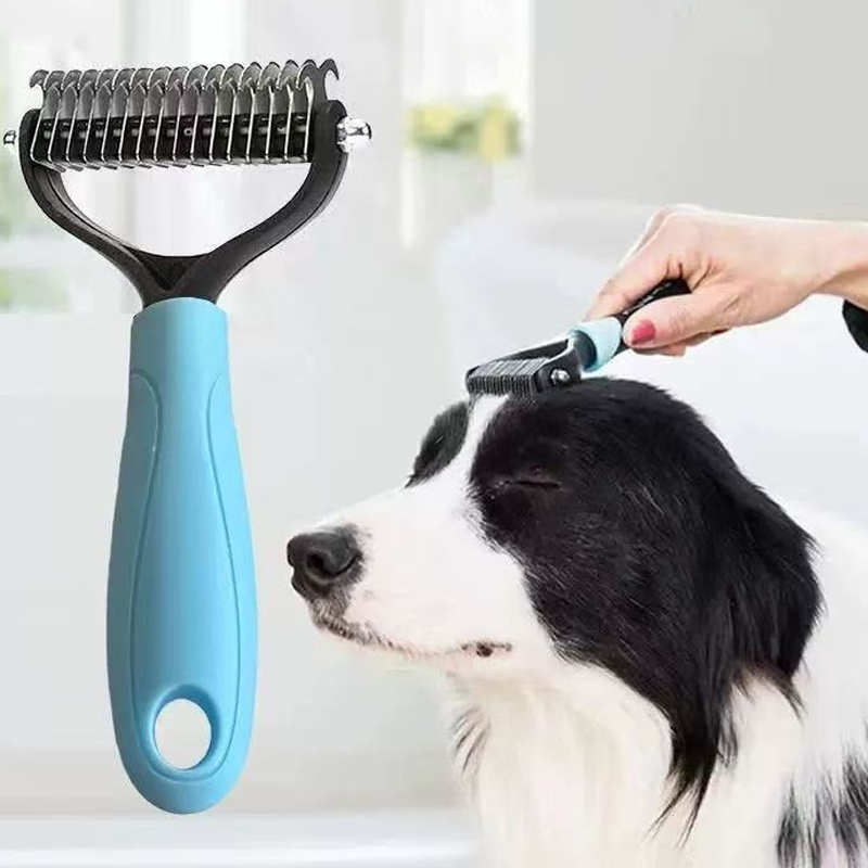 Blue dual-sided grooming tool with a dog grooming scene