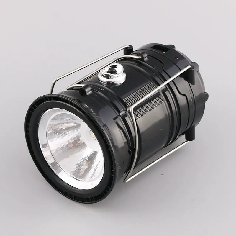 Black lantern with front flashlight lens