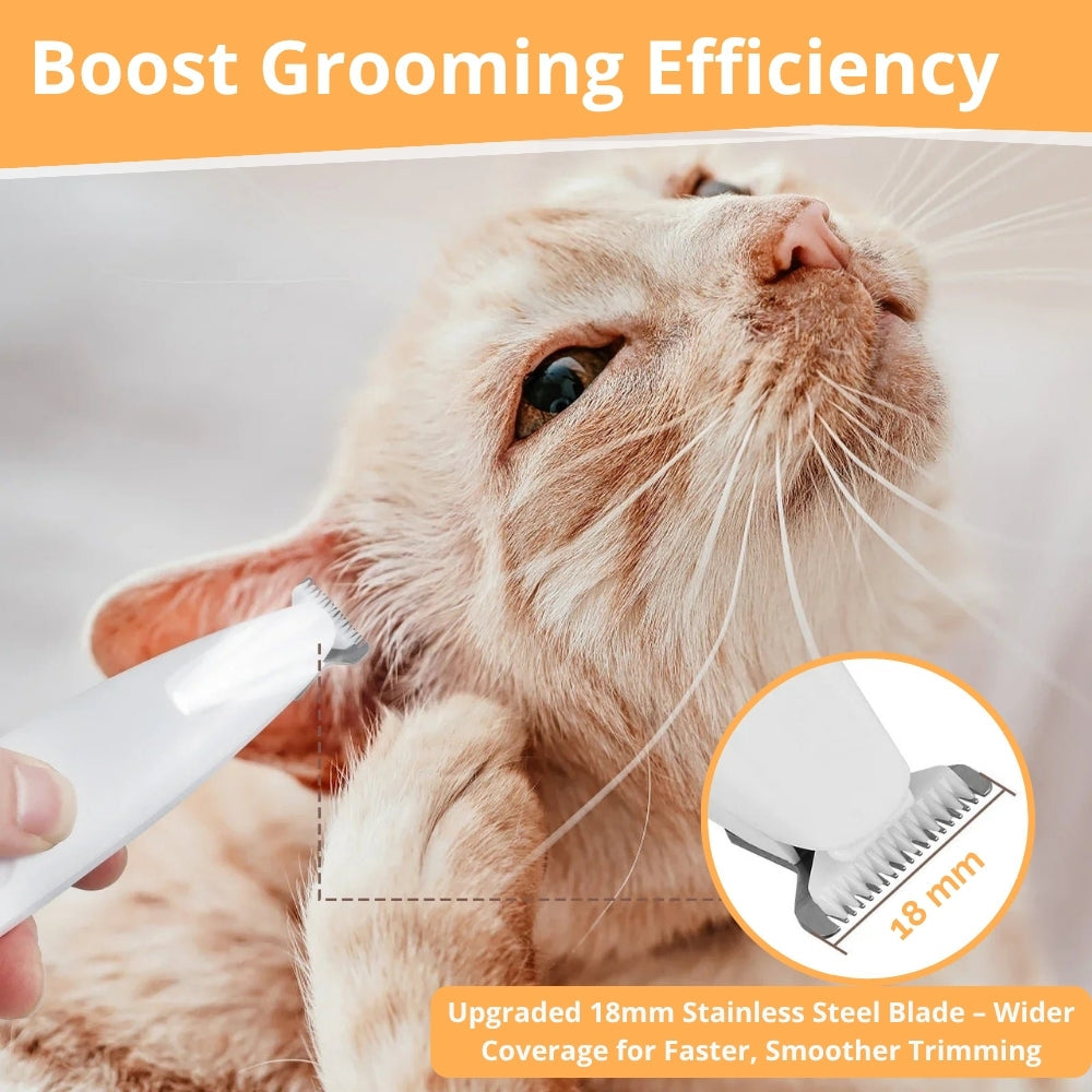 Close view of a pet trimmer blade near cat fur