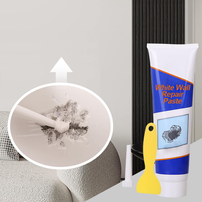Blue tube of white wall repair paste with nozzle and yellow scraper