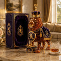 Lion-shaped glass decanter with crown stopper on a bright tabletop