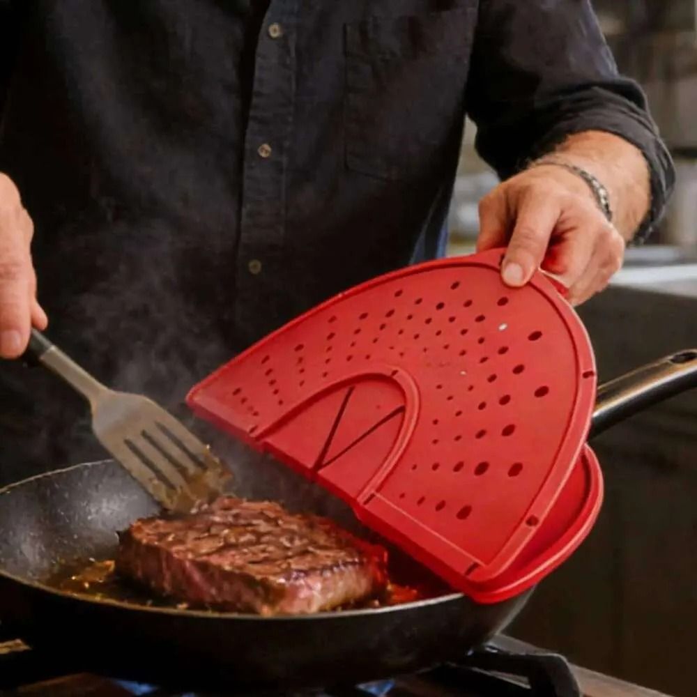 Red guard folded over a pan