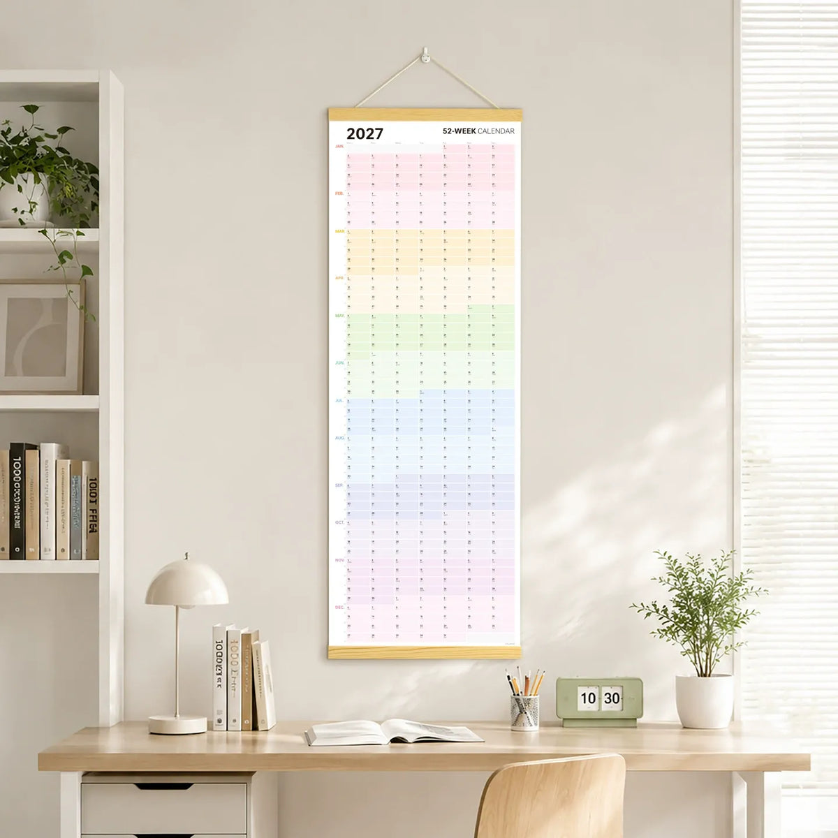 2027 wall calendar above a desk