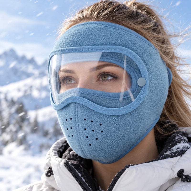 Blue face mask worn outdoors in snow